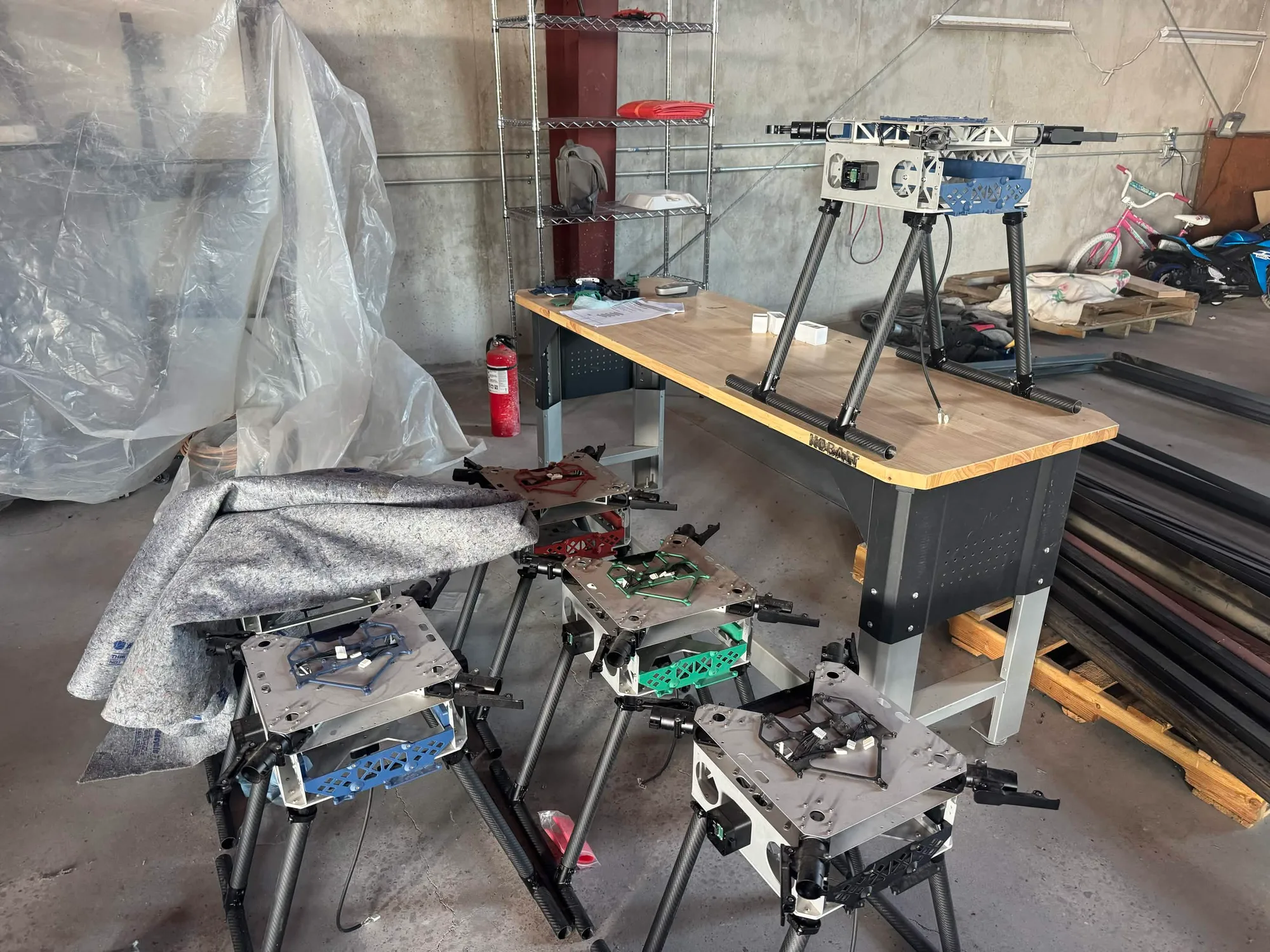 Several airframes in progress in the shop